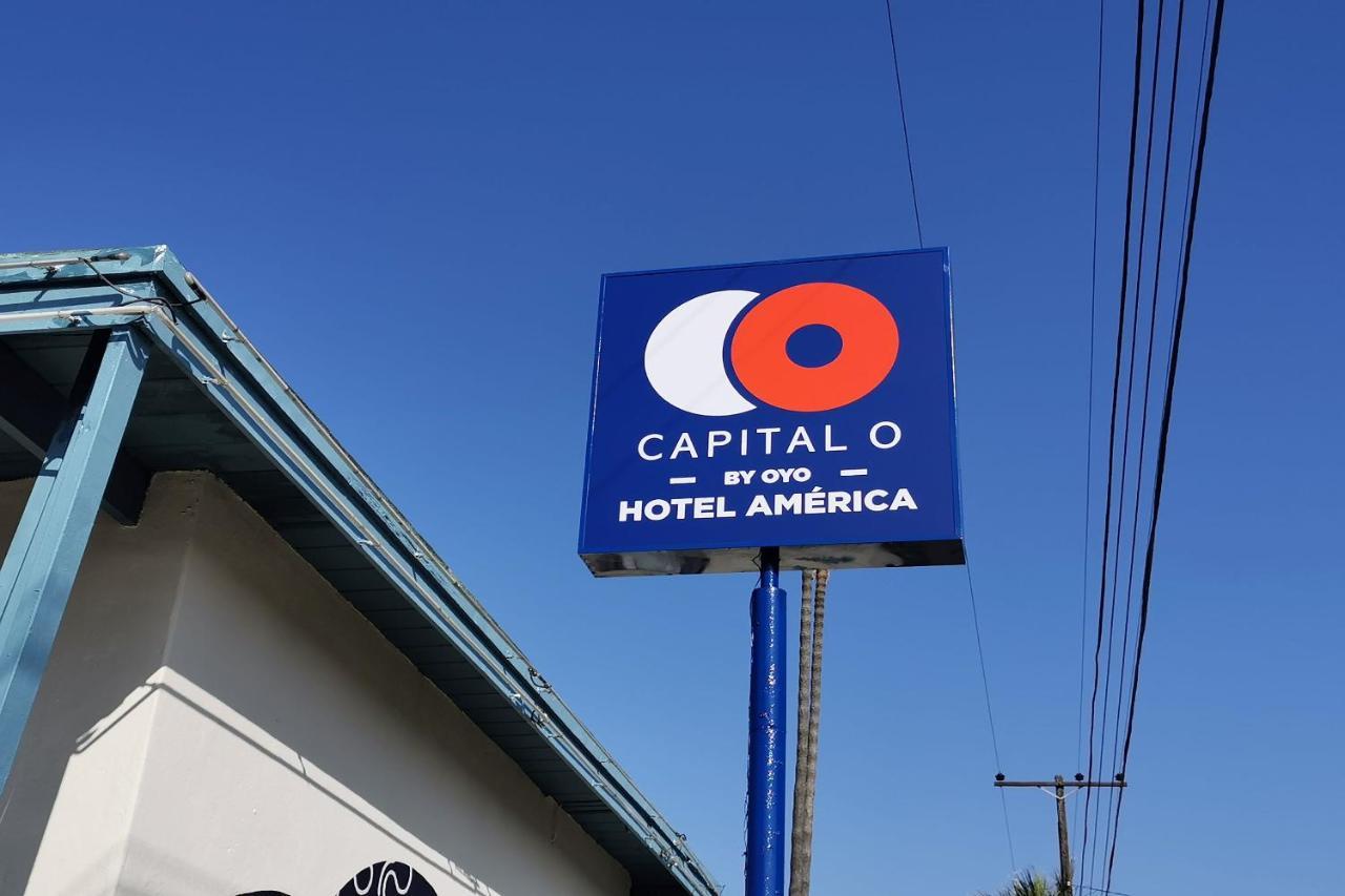 Capital O Hotel America 恩塞纳达港 外观 照片
