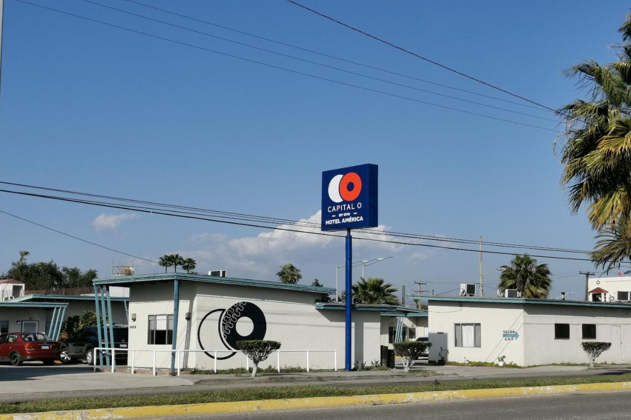 Capital O Hotel America 恩塞纳达港 外观 照片